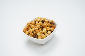 Roasted chickpeas or bhuna chana isolated on white background                                            