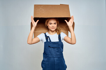 Woman in working uniform box packing service lifestyle