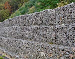 Coastal engineering protection. Gravel blocks are reinforced with steel meshes. Wall to protect the hill from destruction and landslides.