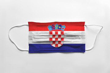 Face mask with Croatia flag printed, on white background, isolated