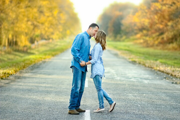  couple in love on road are walking