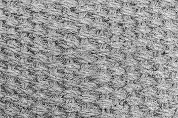 Texture of woven fabric of jute fibers, black-white textured backdrop effect background for design. Natural fiber, jute thread, weaving of rough burlap material