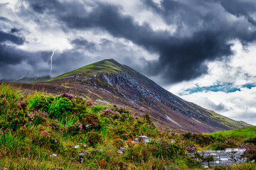 Lightning over a mountain