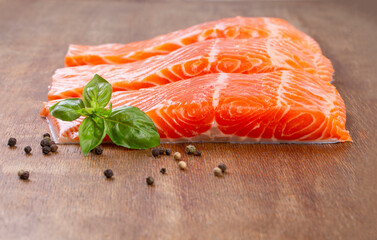 Three pieces of fresh raw salmon