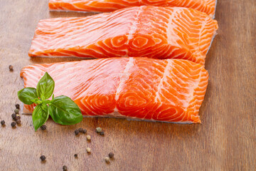 Three pieces of fresh raw salmon