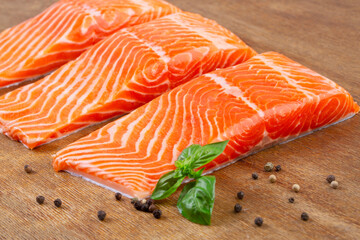 Three pieces of fresh raw salmon