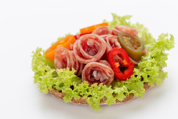 Sandwich with salami sausage on white background.
