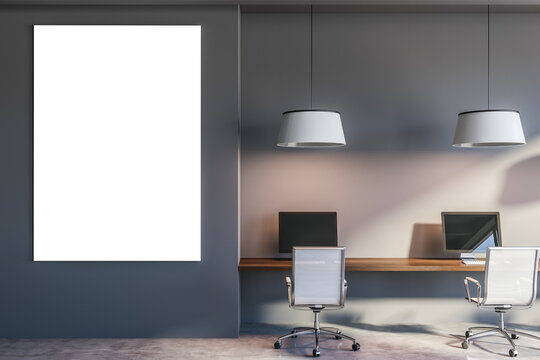 Modern gray open space office interior with poster