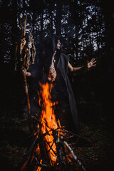 Kodun with marks on the body in the forest