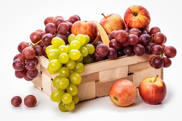 Fototapeta na wymiar Green and pink grapes and apples in a basket on a white background