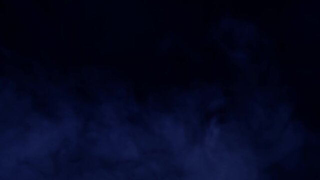 Blue steam, vapor on a black background, mistic spooky intro