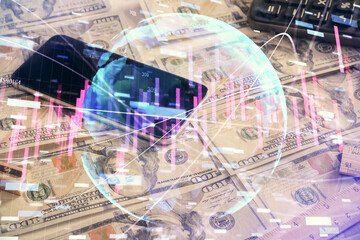 Double exposure of forex graph drawing over us dollars bill background. Concept of financial markets.