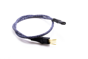 Broken USB braided cable on white isolated background