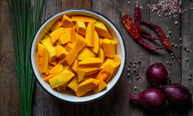 sliced pumpkin on wooden board