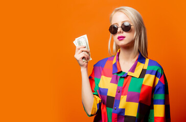 Style blonde in 90s shirt with dollars