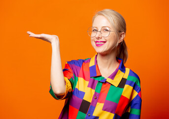 Style blonde in 90s shirt and glasses