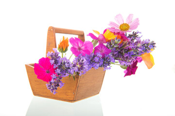 Flower bouquet in harvest basket