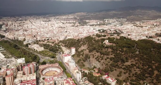 Malaga with Placa de Torros from castle in sunny time. Andalusia, Spain . High quality 4k footage