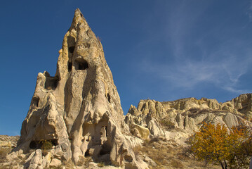 Naklejka premium Groeme open air museum in Cappadociawith rock cut dwellings and churches