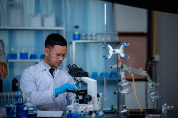 The researchers are working in a chemical laboratory.