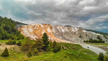 Fototapeta na wymiar Mammoth Hot Springs, Yellowstone National Park. Aerial view from drone viewpoint
