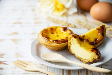 Egg tart recipe - famous dessert cooking concept	