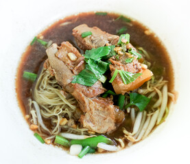 Egg noodles with stewed pork soup