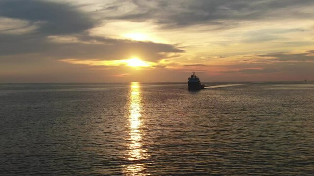 A large tug for transporting ships by water is in the Indian ocean.