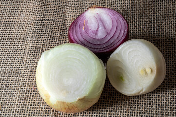 Red, yellow and white onions on white background in Brazil