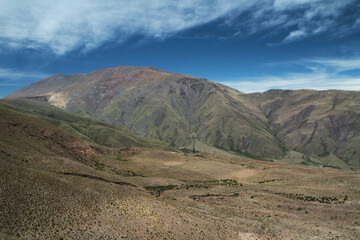 Aerial view of the green field, valley and mountains in Salta, Argentina.