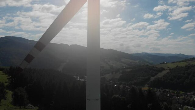 Landing in front of wind turbine