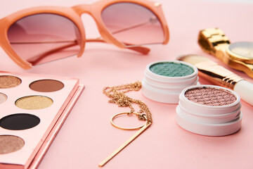 eyeshadow makeup brushes collection professional cosmetics accessories on pink background