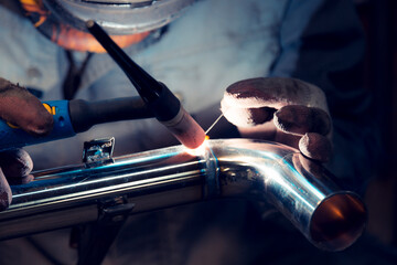 TIG welding of polished stainless steel pipe - 381256568
