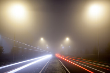 Road with lights in the fog