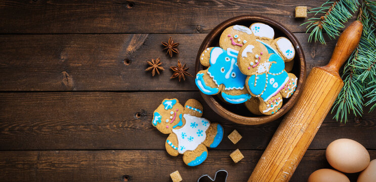 Ingredients for cooking Christmas cookie man on wooden background with copy space top view