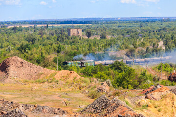 Naklejka premium Freight train in the iron ore quarry