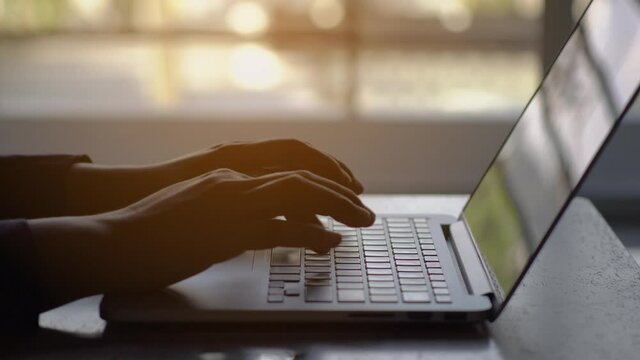4K.Business working on tablet computer, Extreme close-up Woman hands on keyboard 4K. businessman hands type on laptop keyboard business 4K Hands touch typing pointing cloud data social network media.