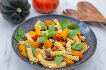 vegan autumn pasta with pumpkin and black beans