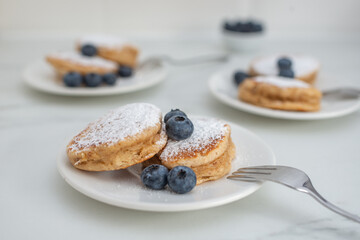sweet home made blueberry pancakes on a table