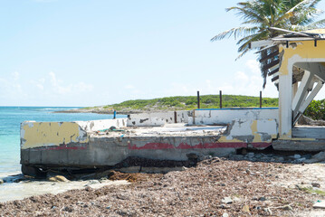 Fototapeta na wymiar Damage abandon homes as a result of hurricanes and storms hitting the Caribbean island of St.Maarten