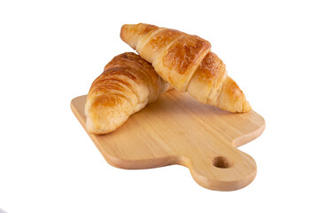 croissant recipe on wooden plate isolated over white background