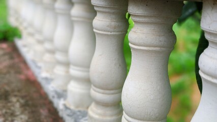 White balusters stone railing. stone balustrade railings. The cement railings with white color on...