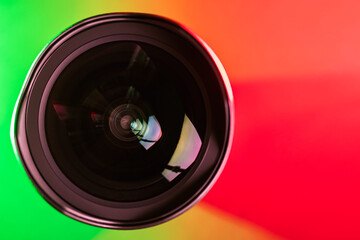The camera lens and the beautiful multi-colored gradient color. Optics.