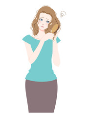 髪のパサツキに悩む女性