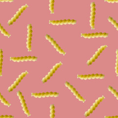 Fusilli pasta random flat lay on red background without shadow. can be used as raw pasta background, poster, banner not pattern.