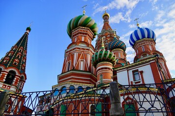 Fototapeta na wymiar Moscow, Russia - August, 2020: St Basil's Cathedral is the main attraction of the Russian capital against a blue sky. Moscow city tour. Summer Landscape. Tourist places are obligatory to visit in