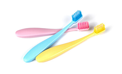 Set of colorful toothbrushes isolated over white