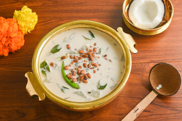 Onam Sadhya, Kerala vegetarian curry Olan a vegetable curry Kerala cuisine in South India on banana leaf. prepared from white gourd, lentil, coconut milk and ginger seasoned with coconut oil 