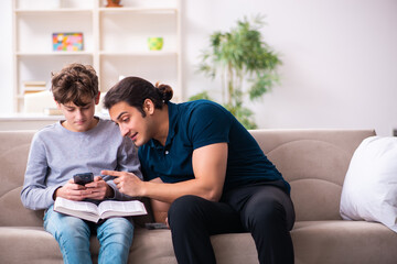 Father and son in exam preparation concept