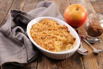 apple crumble on wood background